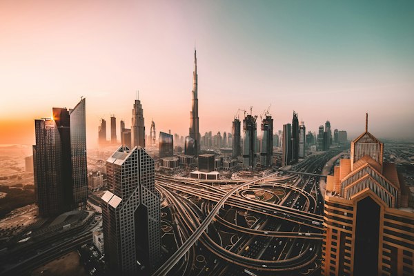The Dubai skyline at sunset, the Burj Khalifa at its centre